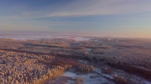 High above flight over winter forests and fields, 4k AERIAL. Stock Footage 167131869