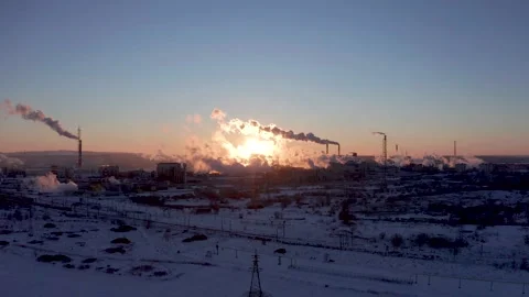 High above the plant and a cloud of smoke is coming from the chimney. Stock Footage 170386396