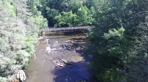 High above the Toccoa river and suspension bridge Video stock 57283261