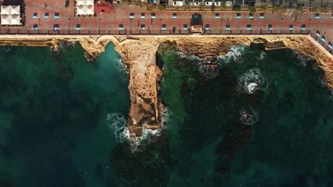 High Above View Showcasing Busy Coastal Promenade With Rugged Rocks And Stock Footage 336468098