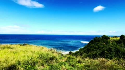 High action, rich, vibrant drone footage of ocean and mountain in background Stock Footage 209919393