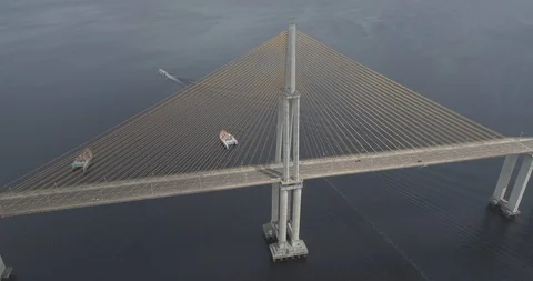 High aerial above the cable-stayed Rio Negro Bridge that links the cities of 스톡 동영상 101293416