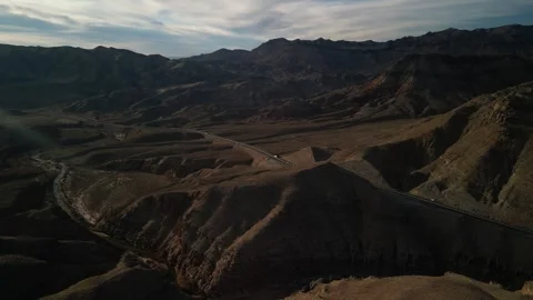 High aerial above interstate 15 through Virgin River Canyon in Arizona desert Stock Footage 302330874