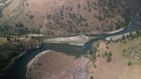 High aerial above Salmon River in Frank Church Wilderness in Idaho on smoky day Stock Footage 283882653