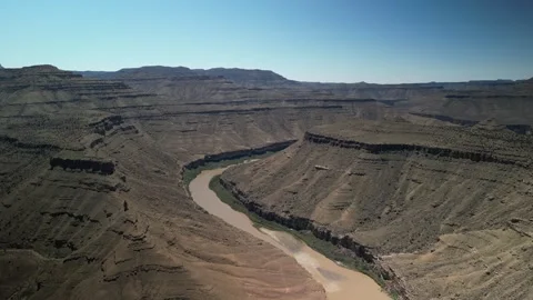 High aerial back away over Green River in central eastern Utah in spring Stock Footage 334016998