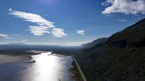 High aerial drone view of E6 highway looking towards Lakselv Norway Vidéo 332893058