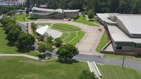 High aerial drone view fly over parking lot and amphitheater Stock Footage 171135107