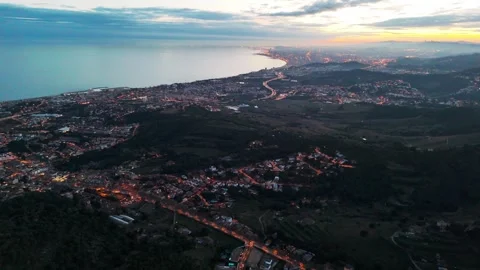 High Aerial Evening Flight Over Alella, Spain | Barcelona in the Background | 4K Stock Footage 302911677