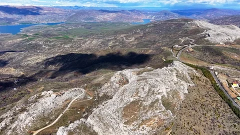 High Aerial Orbit Over Rugged Mountains River and Open Steppe Landscape Stock Footage 342153036