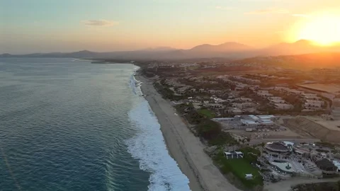 High Aerial Pullback Over Puerto Los Cabos at Dusk With San Jose del Cabo and Stock Footage 340298408