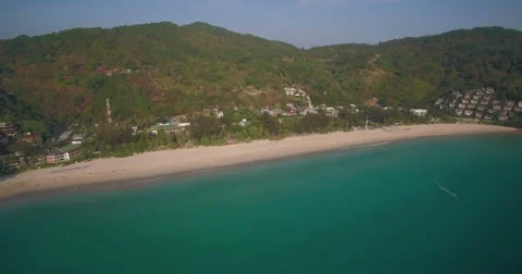High Aerial Pullback Shot Over Tropical Beach and Turquoise Ocean Stock Footage 63091934