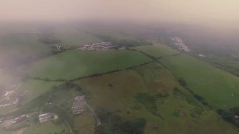 High Aerial shot in Clouds over Wales Stock Footage 90516795