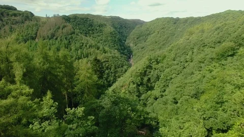 High Aerial shot over a small National Park in Wales Stock Footage 90536201