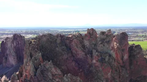 HIGH AERIAL OF SMITH ROCK IN SMITH ROCK STATE PARK IN CENTRAL OREGON Stock Footage 151053691