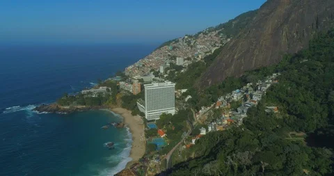 High aerial tilting down over forests, mountains, the beach, ocean, favelas and 스톡 동영상 126114069