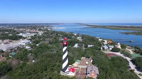 High aerial video of the St. Augustine lighthouse viewing ocean in background Video stock 62473457
