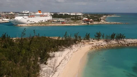 High Aerial View of Eight Mile Rock Shoreline and Sea, Grand Bahama Stock Footage 89390786