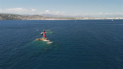 High aerial view of Fourmigue rock and Juan-les-Pins bay near Antibes Franc.. Stock Footage 344753546