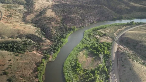 High aerial view looking down on Colorado River near McCoy Colorado in summer Stock Footage 246430714