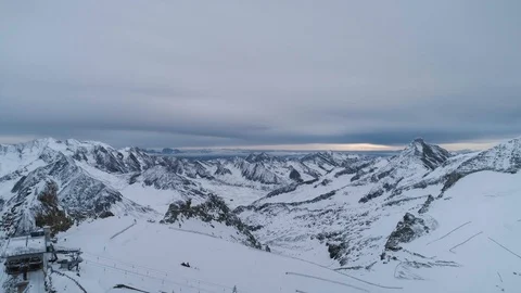 High aerial view looking over ski lifts and Alps Stock Footage 102444386