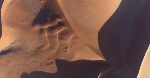 High aerial view of  one of the vast sand dunes in the Namib desert Video stock 78201975