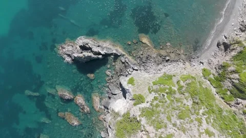 High Aerial View of Rugged Coastline and Open Sea – 4K Drone Footage Stock Footage 310180732