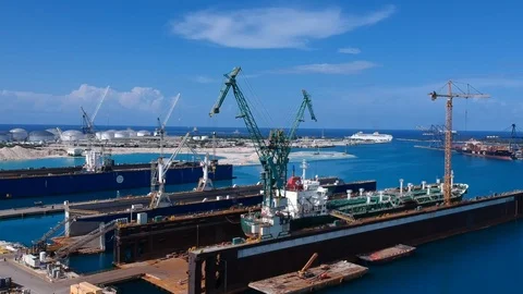 High Aerial View of Shipyard Dry Dock Complex in Freeport, Bahamas Stock Footage 94413306