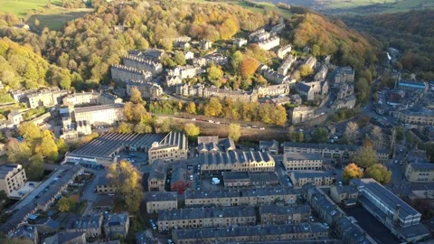 High aerial view of the town of hebden bridge in autumn Stock Footage 321432672