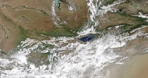 High-altitude aerial of a circle of clouds over Lake Balkhash , Kazakhstan Stock Footage 92264339