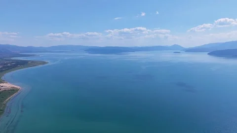 High Altitude Aerial Drone Flyover of Lake Prespa  with Golem Grad Island Stock Footage 341678441
