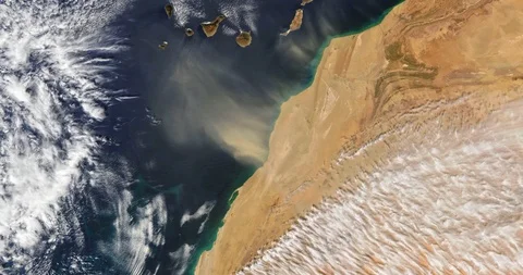 High-altitude aerial of dust storms off the coast of Morocco and Western Sahara Stock Footage 127110686