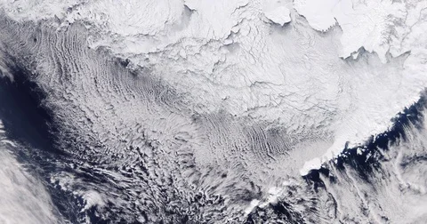 High-altitude aerial of ice sheets and sea ice, northern Bering Sea coast Stock Footage 84576148