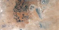 High-Altitude Aerial Of Otherworldly Landscapes, New Mexico's Potrillo Volcano Stock Footage