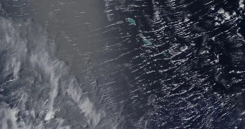 High-altitude aerial of the remote Gilbert Islands in the central Pacific Ocean Stock Footage 77600956