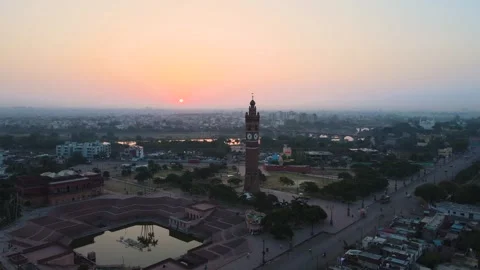 High-altitude aerial shot of Lucknow’s Clock Tower, showcasing its grandeur at Stock Footage 299251453