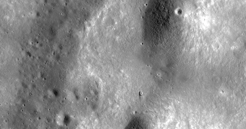 High-altitude aerial of surface exploration vehicle traversing lunar surface Видео 116190253