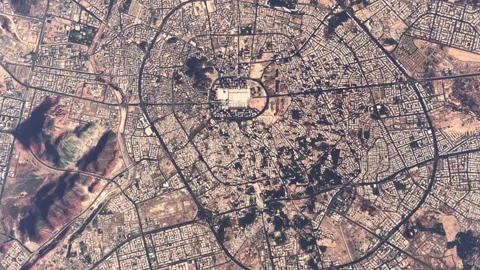 High altitude aerial top down view of Al-Masjid an-Nabawi Medina 4k animation Stock Footage 304450426