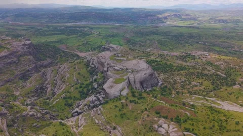 High Altitude Aerial View of Massive Rock Formations and Rugged Terrain Video stock 341103221