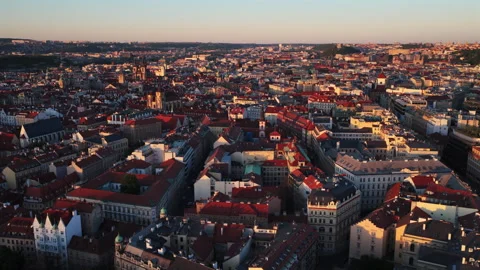 High-altitude aerial view of Prague's old town panorama with red-tiled rooftops, Stock Footage 336598076