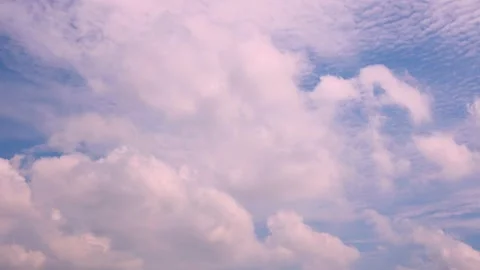 High-altitude and low-altitude clouds cross and fly past each other. Stock Footage 278178348