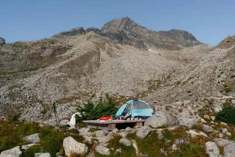 High altitude camping experience under the clear sky in the mountains. Stock Photos