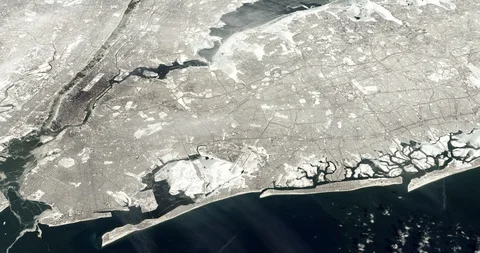 High-altitude circular tracking shot of a frozen New York City Stock-Footage 97321703