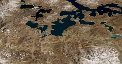 High-altitude circular tracking shot of Lake Puma Yumco, Tibet Stock Footage 97329522