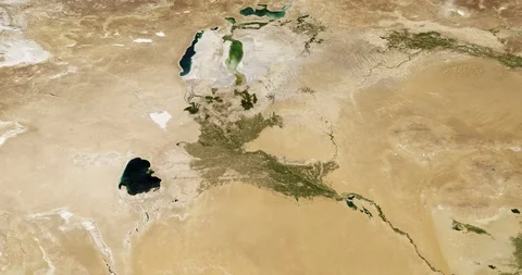 High-altitude circular tracking shot Turkmenistan Uzbekistan border Stock Footage 97336884