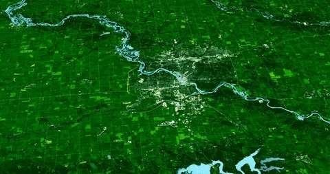 High-altitude circular tracking shot of Cedar Rapids, Iowa Stock Footage 97341929