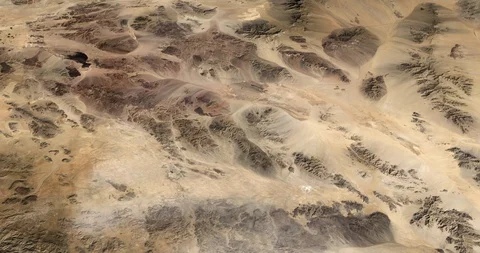 High-altitude circular tracking shot: California's Mojave Desert Stock Footage 97342539
