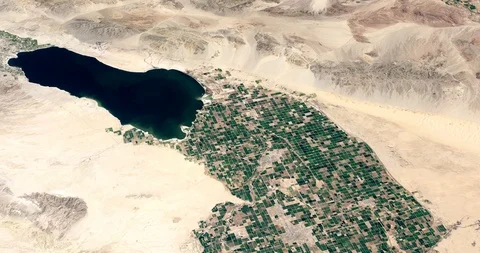 High-altitude circular tracking shot of Salton Sea, California Stock Footage 97342937