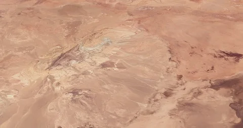 High-altitude circular tracking shot of Iran's Great Salt Desert Stock Footage 97345729