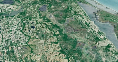 High-altitude circular tracking shot of marshland, Florida's coast Stock Footage 97423967