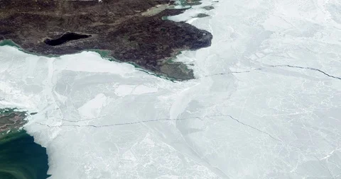 High-altitude circular tracking shot of Great Slave Lake, Canada Stock Footage 97429551